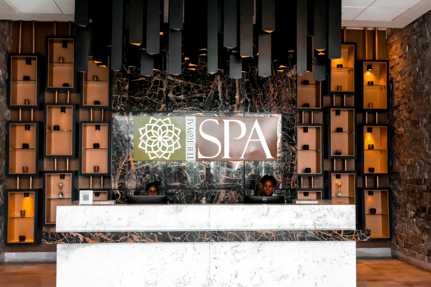 Staff behind the reception counter at a spa in Punta Cana